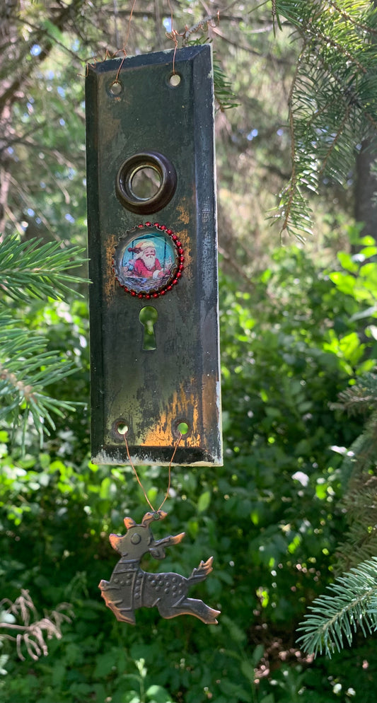 The Door to December Magic decorated vintage doorplate